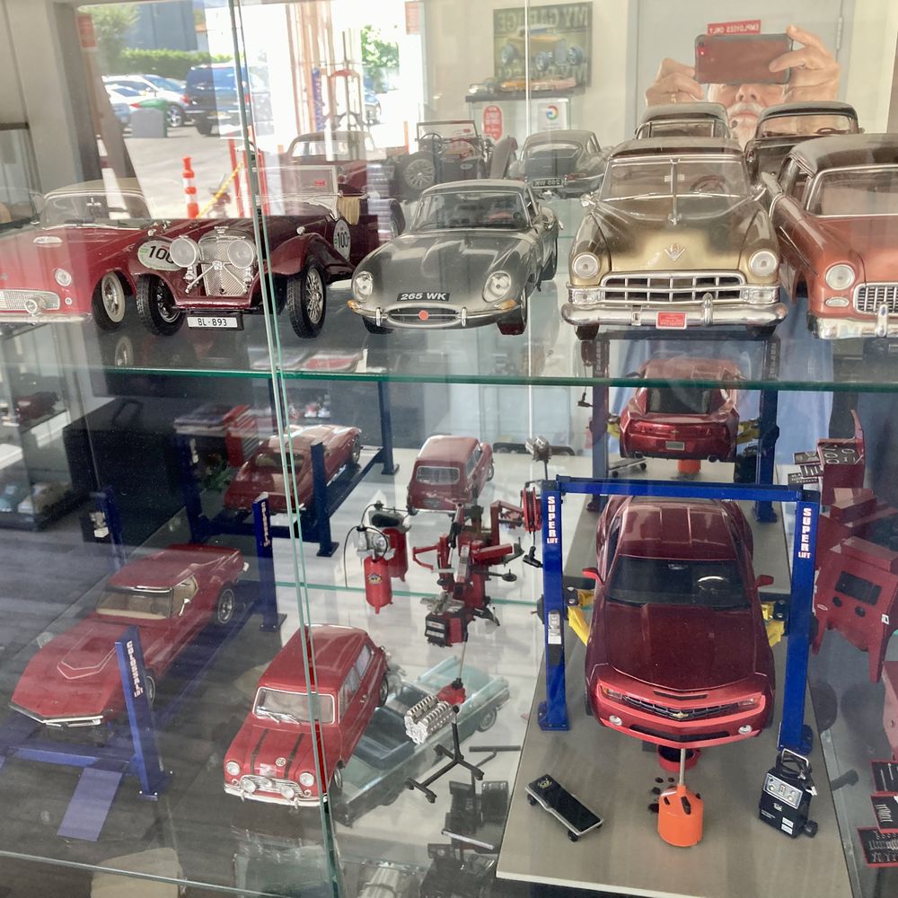 A display case in the customer waiting room. It's a modest room but shows off the owner's authentic interest in classic cars A display case in the customer waiting room. It's a modest room but shows off the owner's authentic interest in classic cars