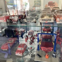 A display case in the customer waiting room. It's a modest room but shows off the owner's authentic interest in classic cars A display case in the customer waiting room. It's a modest room but shows off the owner's authentic interest in classic cars
