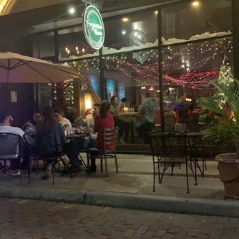 Forgotten Tonic - Loved the Christmas decor! Sitting outside gave us a great opportunity to see all the horse drawn carriages come by every so often. - Wine Bars Near Me - Saint Augustine, Florida