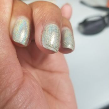 Yvonne's Nails - Lumpy on the middle finger - Nail Salons Near Me - Fremont, California