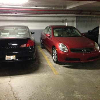 McClurg Court - Parking garage. Parked beside another Infiniti. The red one is my G-Ride - Apartments Near Me - Chicago, Illinois McClurg Court - Parking garage. Parked beside another Infiniti. The red one is my G-Ride - Apartments Near Me - Chicago, Illinois
