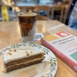 Delicia Cafe & Bakery - Iced pistachio latte with almond milk and the vegan/GF carrot cake