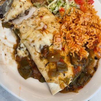 Chuy's - Steak Fajita burrito with hatch green chile sauce - Tex-Mex Near Me - Frisco, Texas