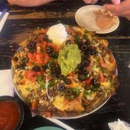 Nachos supreme with machaca.