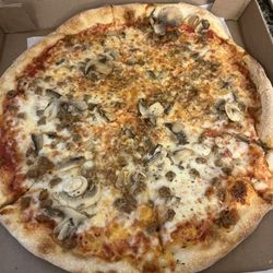 Serpico Pizza - Medium Cheese with Mushroom and Sausage.