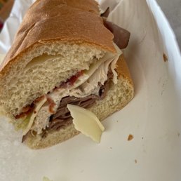 half of a sandwich on a plate half of a sandwich on a plate