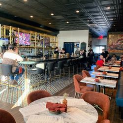 Gilda’s Bar De Tapas - View of restaurant high top by window