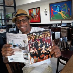 Alvin & Friends - Owner Alvin Clayton with Best of Westchester issue
