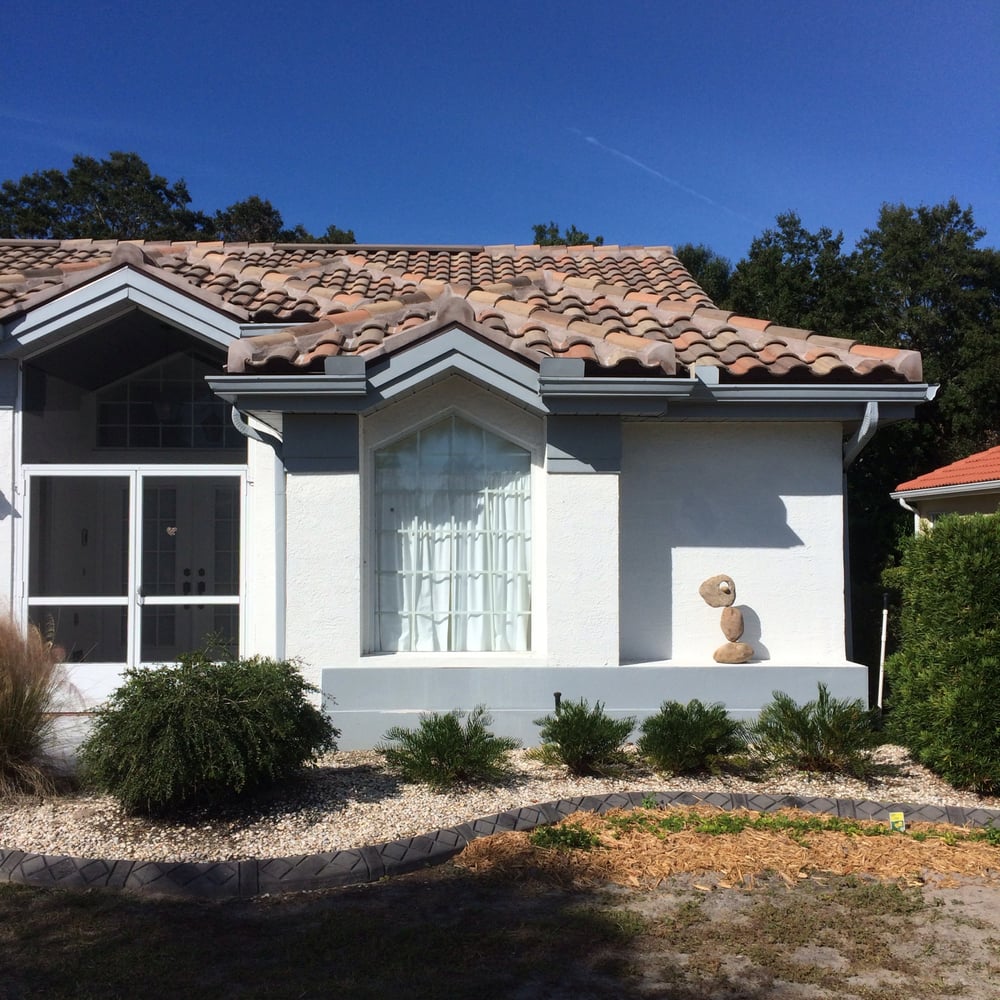 Slide of Sander and Sons Roofing