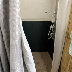 Sparrow Pond Family Campground & Recreation Ctr - Shower (men's room) 3 in this building.