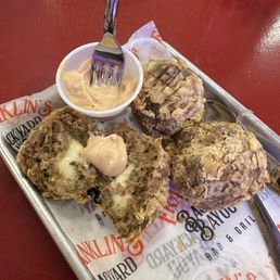 Pepper Jack stuffed boudin balls with remoulade. Pepper Jack stuffed boudin balls with remoulade.