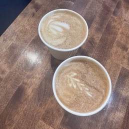 Cappuccino (close) and latte (furthest from camera)