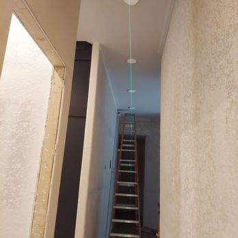Powering Forward Services - Don't just leave quality to chance or eyeball it. We utilize lasers and other tools to ensure a high-quality installation. - Electricians Near Me