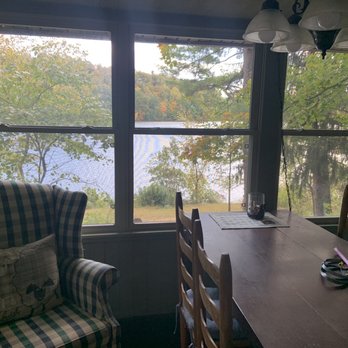 At Lake Logan Cottages - Looking out enclosed porch - Guest Houses Near Me - Logan, Ohio At Lake Logan Cottages - Looking out enclosed porch - Guest Houses Near Me - Logan, Ohio