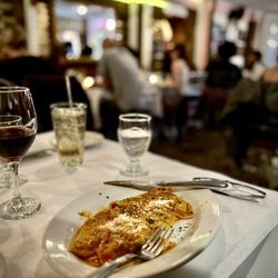 Giovanni's Trattu - Seated at a table in the back of the restaurant