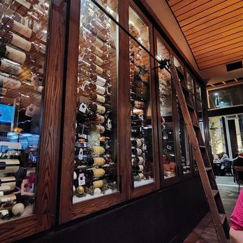 Napa at Kingsley - Wine fridge wall - New American Near Me - Fort Mill, South Carolina Napa at Kingsley - Wine fridge wall - New American Near Me - Fort Mill, South Carolina