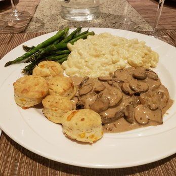 Viking Cooking School - The final product of "playing with fire." Steak diane flambe, lobster mac n cheese, grilled asparagus and rosemary cheese biscuits. Yum. - Cooking Schools Near Me - Atlantic City, New Jersey