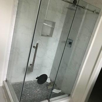 General Glass - Three panel barn door style shower enclosure - General Contractors Near Me - Heath, Texas General Glass - Three panel barn door style shower enclosure - General Contractors Near Me - Heath, Texas