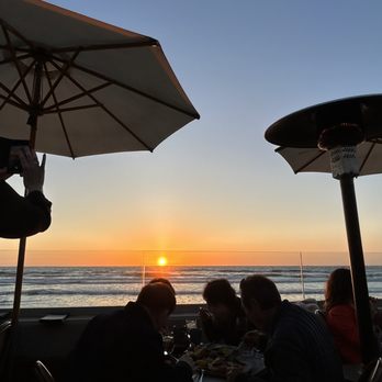 Poseidon on the Beach - Sunset view; Outdoor patio - Seafood Near Me - Del Mar, California Poseidon on the Beach - Sunset view; Outdoor patio - Seafood Near Me - Del Mar, California