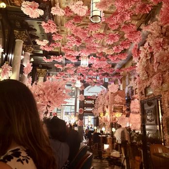 Lillie's Victorian Establishment - Lillie's main Dining Room covered in flowers - Bars Near Me - New York, New York Lillie's Victorian Establishment - Lillie's main Dining Room covered in flowers - Bars Near Me - New York, New York