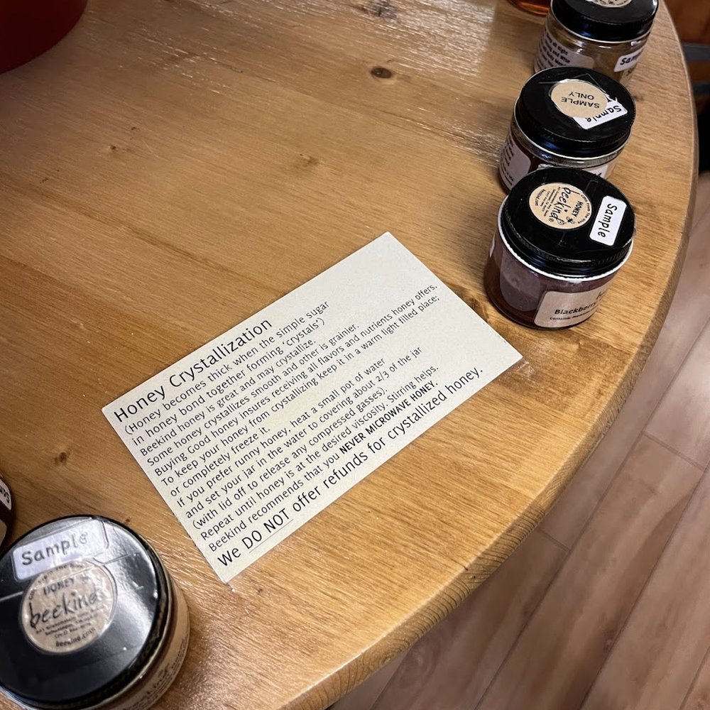 Information about honey and a small selection of their 20+ sample jars!