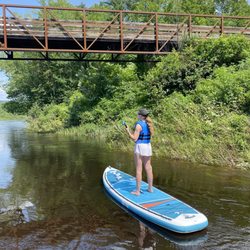 Maine River Runners - Teenager on paddle board.