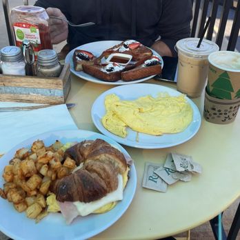 Bonjour Bakery & Café - Ham& cheese croissant with scrambled eggs added. French toast with eggs and bacon. French toast is to die for! - Bakeries Near Me - Moab, Utah Bonjour Bakery & Café - Ham& cheese croissant with scrambled eggs added. French toast with eggs and bacon. French toast is to die for! - Bakeries Near Me - Moab, Utah