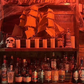 The Captain's Cabin - a shelf full of liquor bottles - Cocktail Bars Near Me - Phoenix, Arizona The Captain's Cabin - a shelf full of liquor bottles - Cocktail Bars Near Me - Phoenix, Arizona