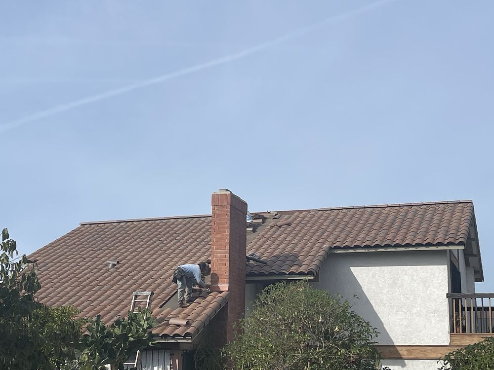 Slide of H Moreno Roofing