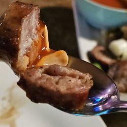 Thai Continental - Thai Sausage with red sauce appetizer.