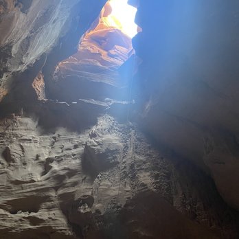 Get In The Wild Adventures - The opening to drop down into the lair - Hiking Near Me - Hanksville, Utah Get In The Wild Adventures - The opening to drop down into the lair - Hiking Near Me - Hanksville, Utah
