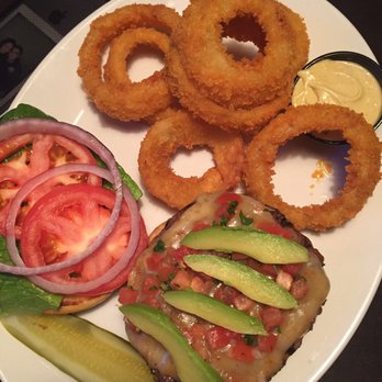 Coaches Bar & Grill - Spicy Southwest Burger ($14)- ghost pepper cheese, pico de gallo & chipotle mayo - Sports Bars Near Me - Bloomington, Indiana