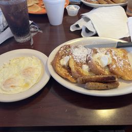 French toast, sausage links, and eggs. French toast, sausage links, and eggs.