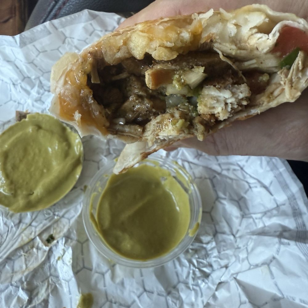The Press - Chicken burrito with green hot sauce - Mexican Near Me - Charleston, South Carolina The Press - Chicken burrito with green hot sauce - Mexican Near Me - Charleston, South Carolina