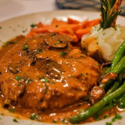 Arturos Bistro - Signature port loin chop stuffed with mozerella and prosciutto