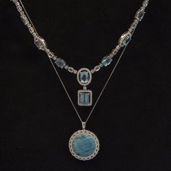 Village Jewelers - 2 aquamarine necklaces.
