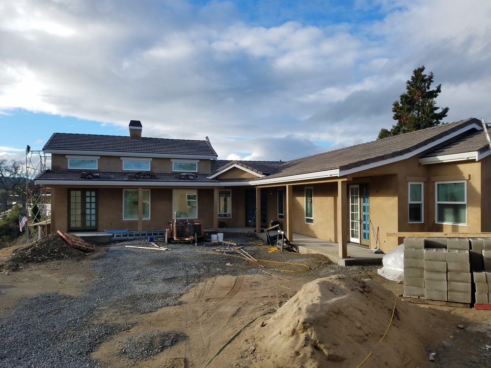 Slide of Trinity Roofing