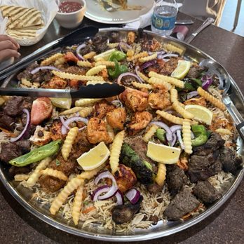 Ruz Bukhari - Afghan Cuisine - Mix Kabob Bukhari Rice- family feast - Mediterranean Near Me - Jacksonville, Florida Ruz Bukhari - Afghan Cuisine - Mix Kabob Bukhari Rice- family feast - Mediterranean Near Me - Jacksonville, Florida