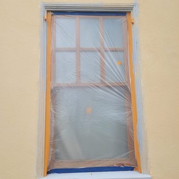 House Painting - Protecting the windows for varnish later. - Painters Near Me House Painting - Protecting the windows for varnish later. - Painters Near Me
