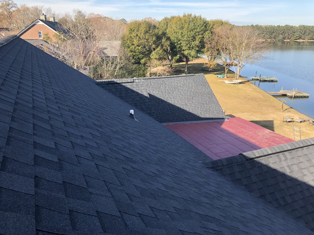 Slide of Canaan roofing and gutters