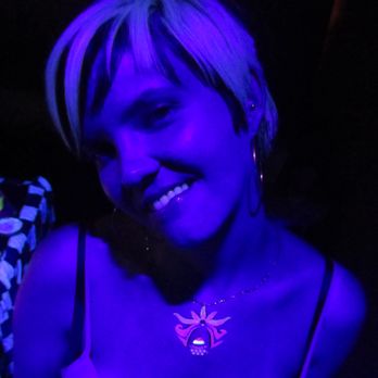 Oliver Twist - Painted-on black light necklace at a night club in San Francisco. - Face Painting Near Me Oliver Twist - Painted-on black light necklace at a night club in San Francisco. - Face Painting Near Me