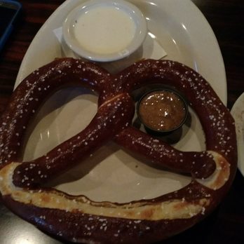 Oscar's Alehouse - Pretzel appetizer comes with a question dip and a spicy beer mustard sauce. Both were yummy - New American Near Me - Eldersburg, Maryland Oscar's Alehouse - Pretzel appetizer comes with a question dip and a spicy beer mustard sauce. Both were yummy - New American Near Me - Eldersburg, Maryland