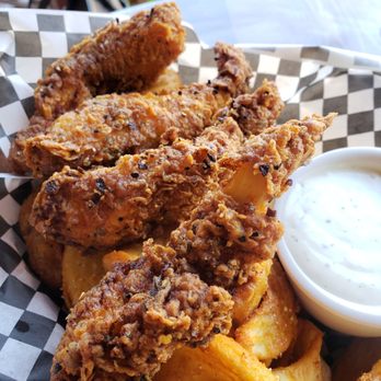 The Rambler - Chicken strips with tornado potatoes - Bars Near Me - Portland, Oregon The Rambler - Chicken strips with tornado potatoes - Bars Near Me - Portland, Oregon