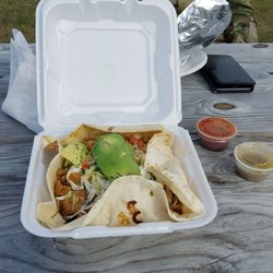 Armando's Flat Grill and Golf - My delicious chicken burrito bowl. It was plenty to eat and fresh ingredients. I love that they added the avocado also.