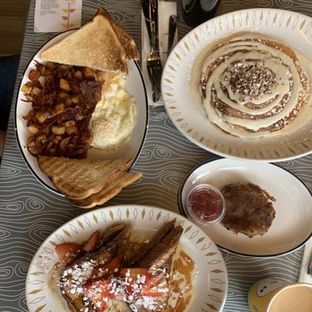 Hatch - Left: corned beef hash Bottom: Holy Moly French Toast Top right: Cinnamon Roll Pancakes Right: side of hashbrown - Breakfast & Brunch Near Me - Huntington, New York Hatch - Left: corned beef hash Bottom: Holy Moly French Toast Top right: Cinnamon Roll Pancakes Right: side of hashbrown - Breakfast & Brunch Near Me - Huntington, New York