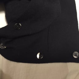 All the buttons are broken after the dry cleaning. All the buttons are broken after the dry cleaning.