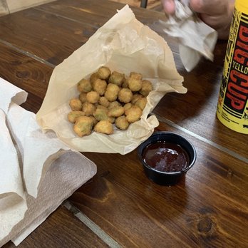 Dickey's Barbecue Pit - a person sitting at a table - Barbeque Near Me - Jensen Beach, Florida