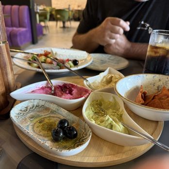 Blue Fig Garden - Hummus Trio w/ canned black olives in oil ! - Mediterranean Near Me - Southbury, Connecticut Blue Fig Garden - Hummus Trio w/ canned black olives in oil ! - Mediterranean Near Me - Southbury, Connecticut