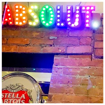 Georgjz419 - a neon sign above a brick wall - Bars Near Me - Toledo, Ohio