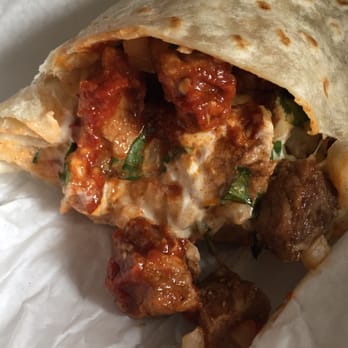 Rice & Spice - Beef Burrito: mine prepared with no beans; yummy spicy sauce, chunks of beef with lots of flavor, rice, cheese and sour cream - Grocery Near Me - Lodi, California Rice & Spice - Beef Burrito: mine prepared with no beans; yummy spicy sauce, chunks of beef with lots of flavor, rice, cheese and sour cream - Grocery Near Me - Lodi, California